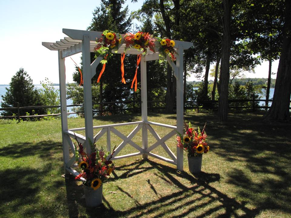 Fall Wedding at Grand Isle Lake House Wedding arbor at Grand Isle Lake